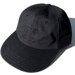 Noise for Now Logo embroidered in black thread onto black dad style ball cap